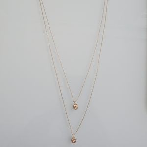 Gold double chain with amber stone